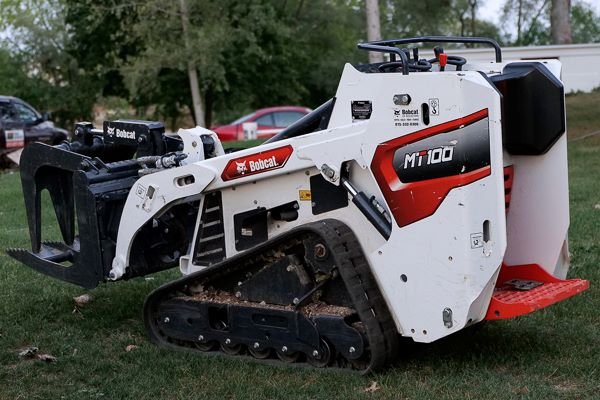 Bobcat MT100 equipped for tree service with grapple